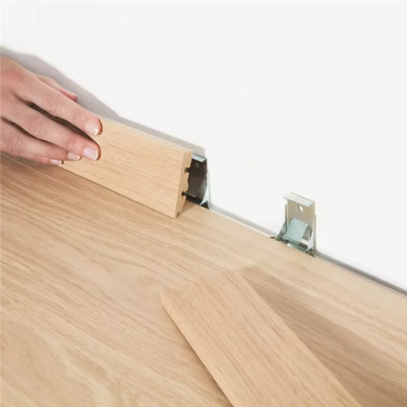 Clips pour fixation de plinthes standards QUICK-STEP